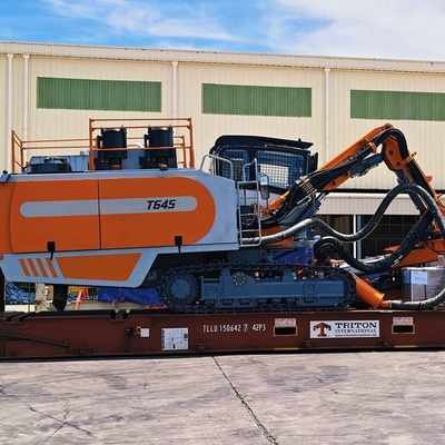Máy khoan lỗ nổ được gắn trên bề mặt để khai thác kim loại quý và thổi